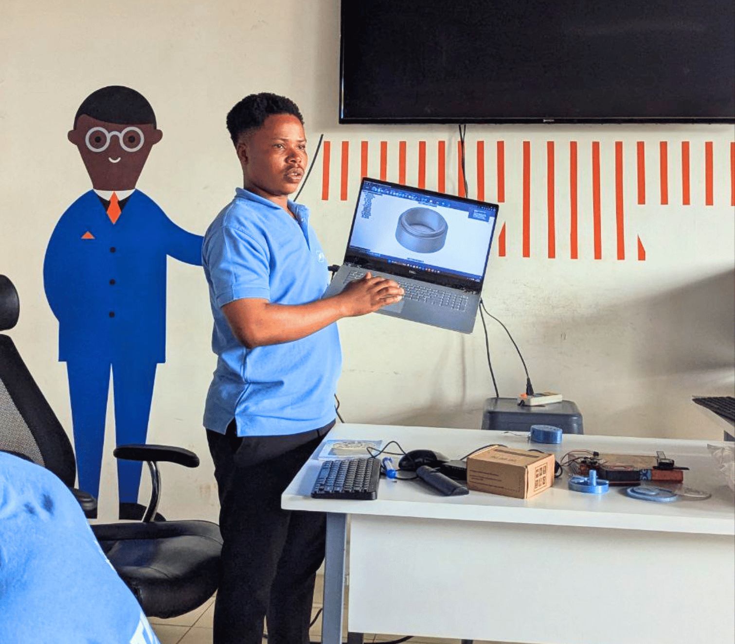 PlastiBytes team member at community outreach